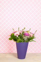 Colorful  bouquet flowers in blue vase
