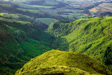 Green hills in valley airview