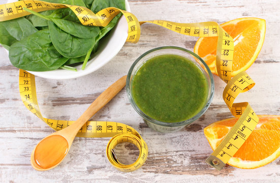 Ingredients, fresh cocktail from spinach and centimeter on wooden background, healthy nutrition and slimming