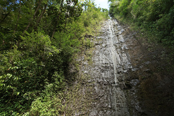 Fototapeta na wymiar Waterfall stone wall