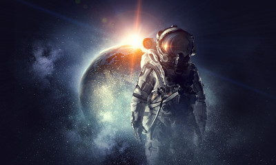 Obraz premium Astronauta w kosmosie. Różne środki przekazu