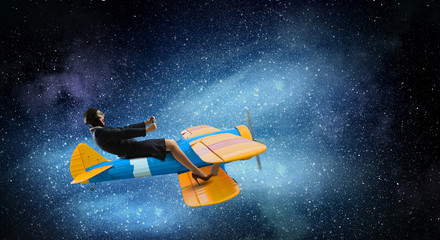 Woman in drawn airplane . Mixed media