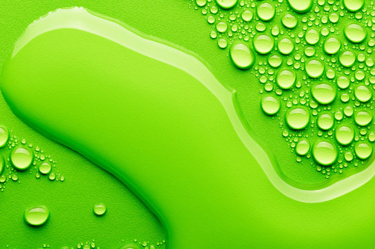 watwr drops on a green background