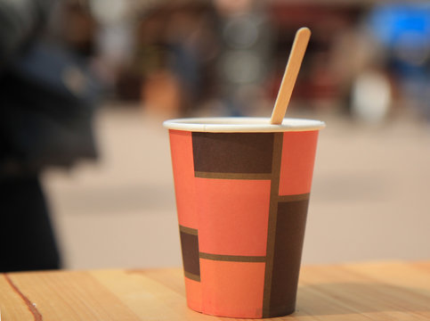 Empty Orange Cup Stirrer Placed On Stock Photo 1736543570