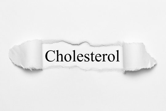Cholesterol on white torn paper