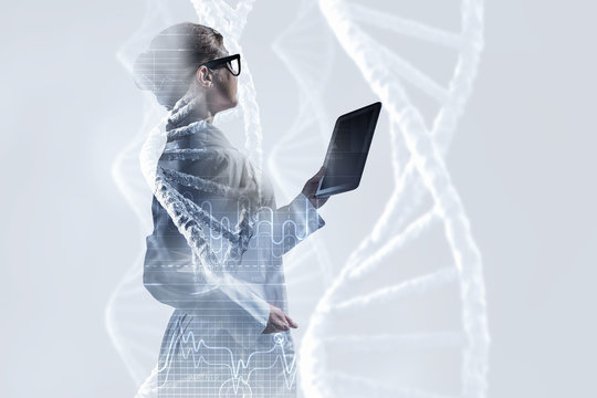 Scientist woman using tablet pc. Mixed media