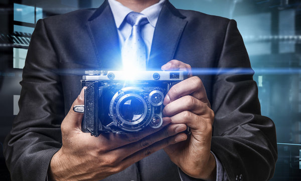 Man with camera in hands
