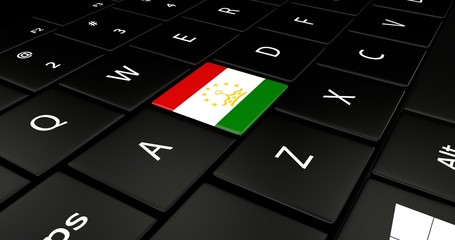 Close up of Tajikistan flag button on laptop keyboard.