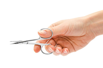 woman hand holding manicure scissors.
