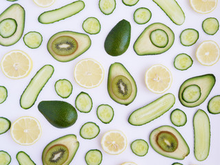 Pattern of fresh cut vegetables and fruits. Abstract food background.