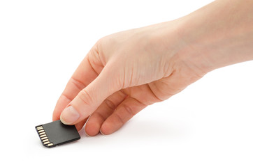 woman hand holding sd flash card.