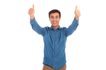 excited young casual man making the ok sign