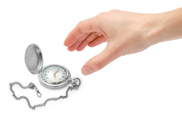 female hand takes or gives pocket watch.