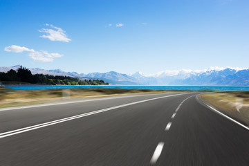 Fototapeta premium empty road with blue sea in blue sky