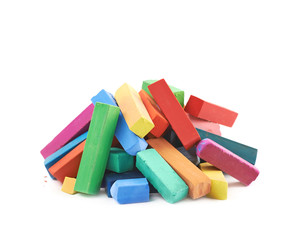 Pile of colorful pastel crayon chalks isolated