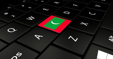 Close up of Maldives flag button on laptop keyboard.