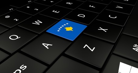 Close up of Kosovo flag button on laptop keyboard.