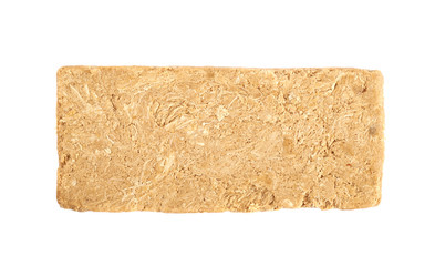 Briquette of nut halva confection isolated