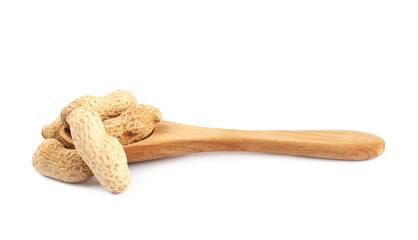 Spoon full of peanuts isolated