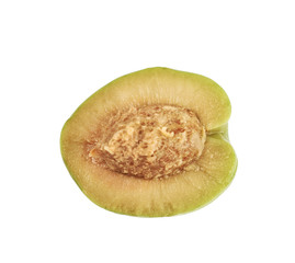 Green olive cut in half isolated
