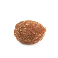 Single green olive pit isolated