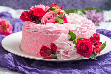 Pink cake with natural beautiful flowers