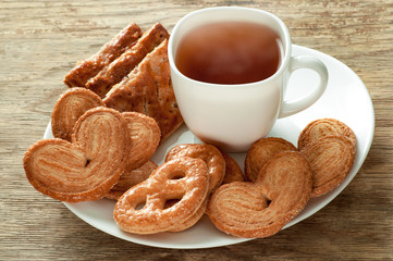 Assorted snacks bakery with a cup of tea