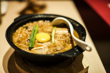 Curry udon with beef and egg