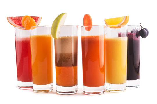 Mix fresh juice, mandarin, orange, apple, carrot and grapes