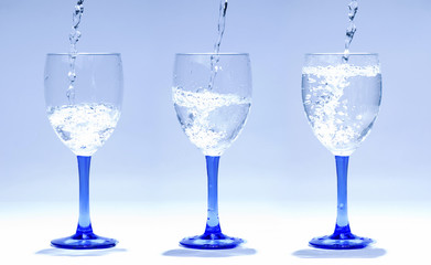 glasses full of water in order
