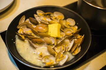 Clams cooking in a pot