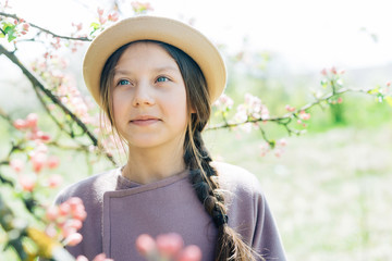 Portrait of a girl in a hat close-up of a spring