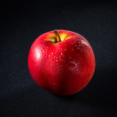 Apple in the spray of water