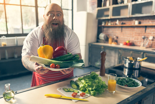 Excited Man Showing Healthy Food