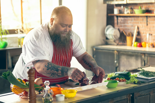 Man Cooking At Home