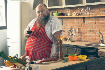 Male chef enjoying alcohol drink