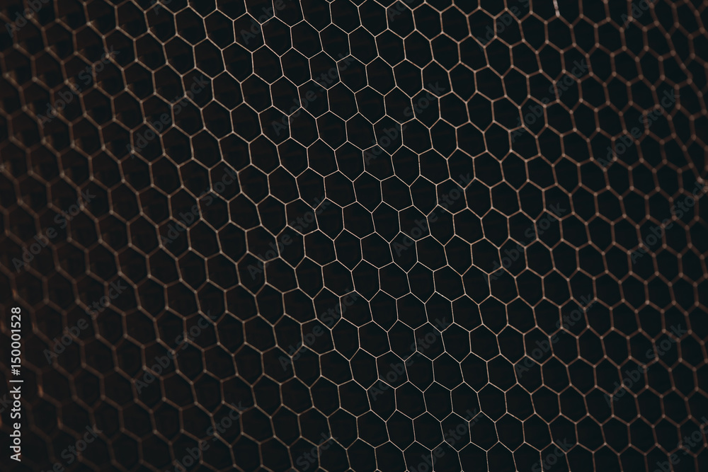 Wall mural abstract texture honeycomb. metallic net background or texture. metal mesh. full frame colourful ill