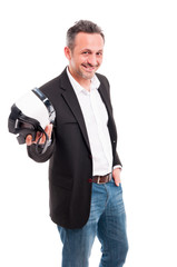 Naklejka premium Smiling handsome male holding futuristic vr gadget