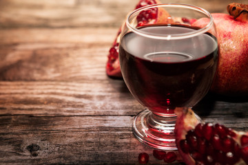 Freshly made pomegranate juice in glass