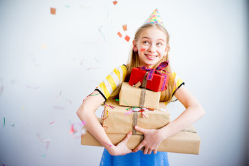Teenager girl holding gifts