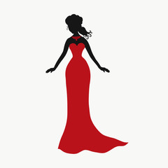 Obraz na płótnie Canvas Silhouette of a charming lady in a long red dress