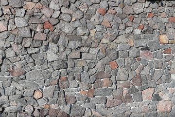 Rubble gray and brown stone wall, rubblework