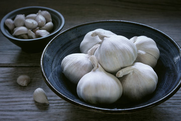 Garlic. Garlic Cloves and Garlic Bulb in bowl.