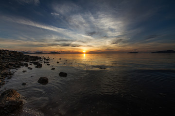 Fototapeta na wymiar Beautiful sunrise at the beach, Saphan Hin,Phuket,Thailand