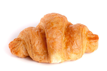 one croissant isolated on white background closeup