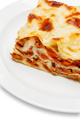 Portion of tasty lasagna isolated on white
