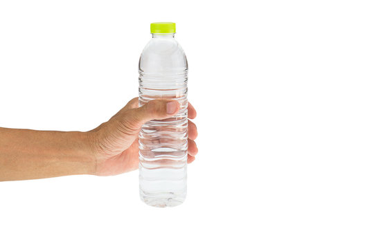 Man's hand holding drinking water bottle isolated on white background