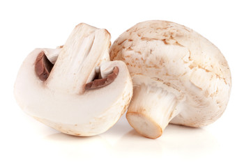 Fototapeta na wymiar champignon mushrooms and half isolated on white background