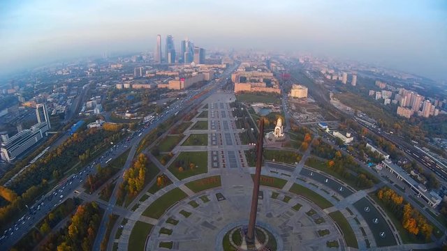 Poklonnaya Hill Victory Park Triumphal Arch statue of Nike monument of St George slaying dragon. Moscow city Russia panorama. Best view in city park. Summer sunrise. Aerial Flight High altitude above