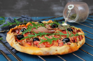 Pizza and arugula. fast food